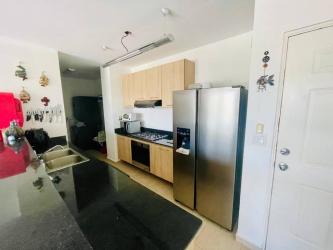 Modern kitchen with granite countertops in beachfront condo Bijao Panama