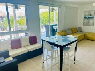 Modern dining area with terrace access in beach condo PH Rodman Bijao Panama