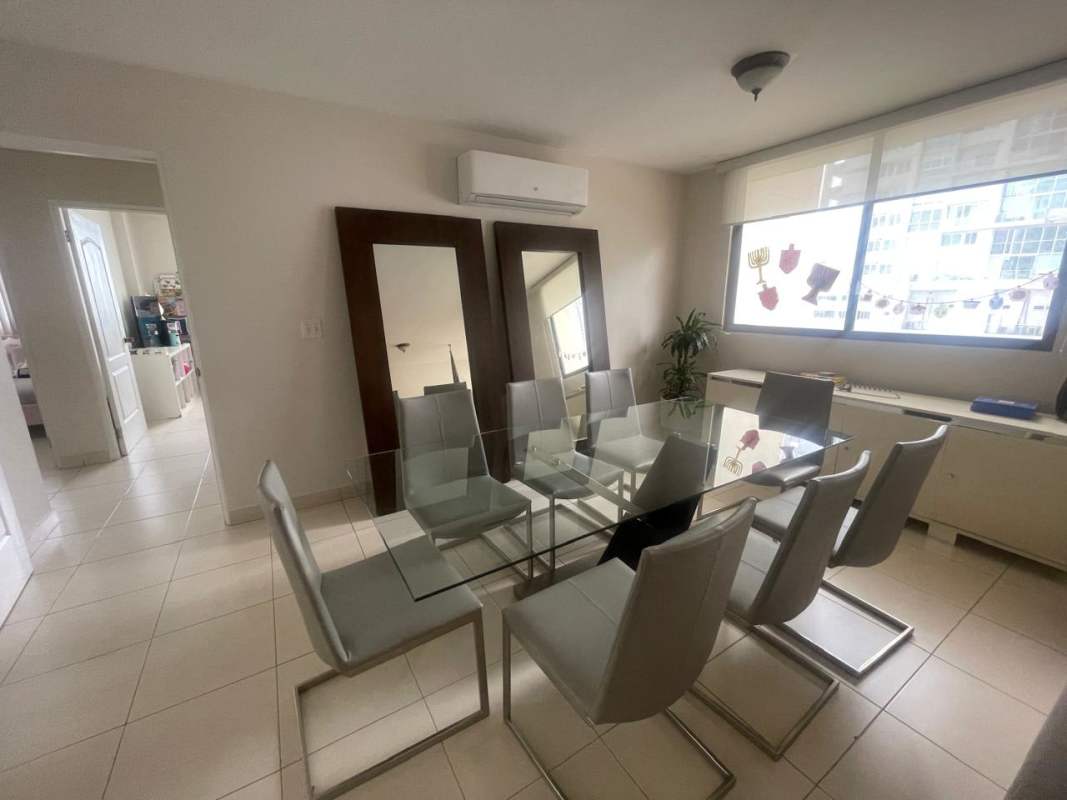 Kitchen with wood cabinetry granite countertops in PH Oceania Punta Pacifica Panama
