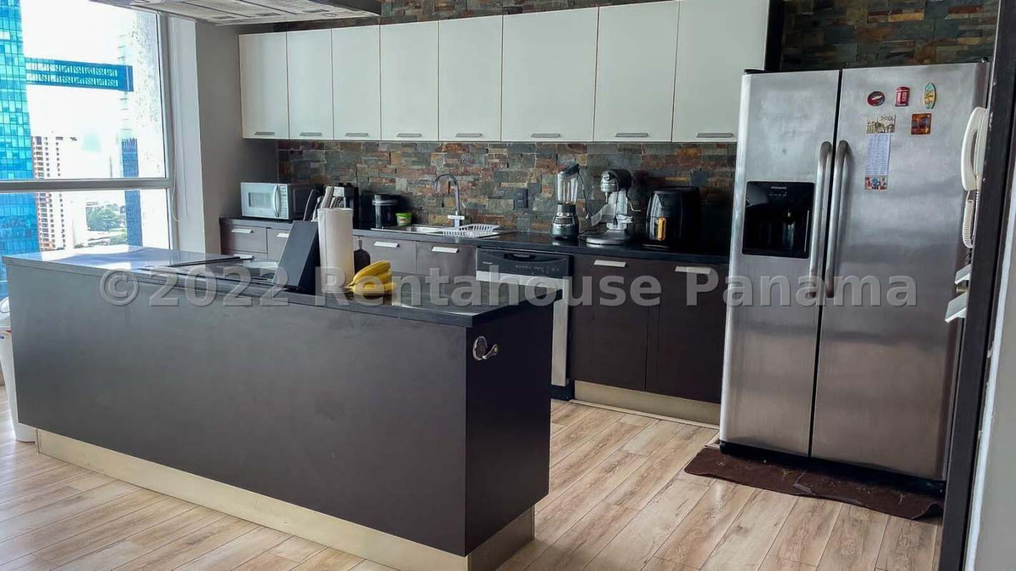Contemporary kitchen with granite countertops and city view PH Oceania Punta Pacifica