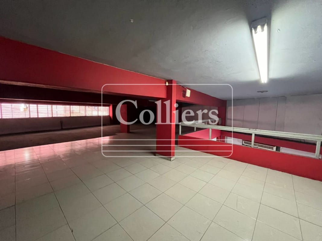 Basement garage or industrial storage area with red walls inside commercial building PH Exposition Center Panama City