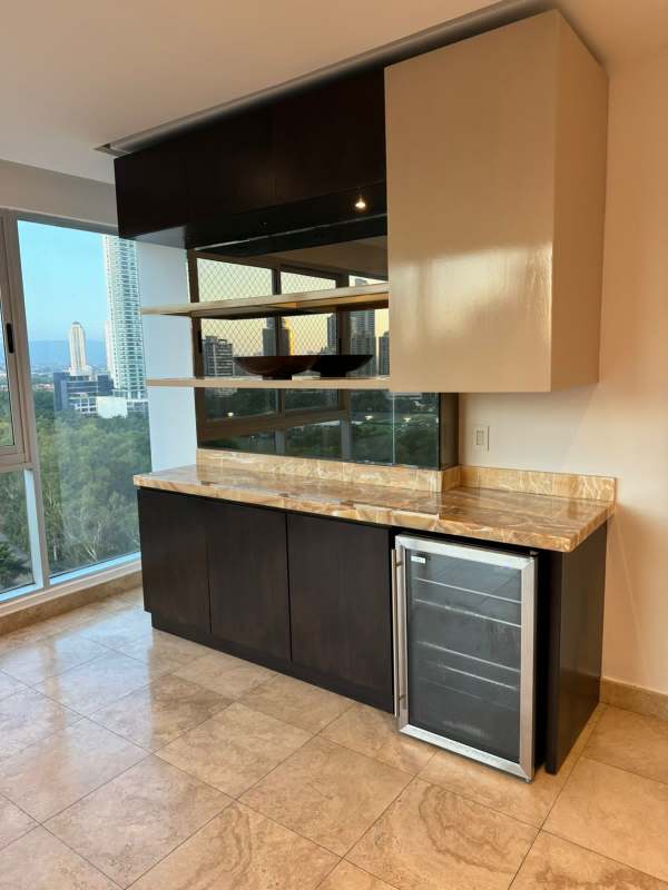 Bedroom with large window city view PH Titanium Costa del Este Panama City