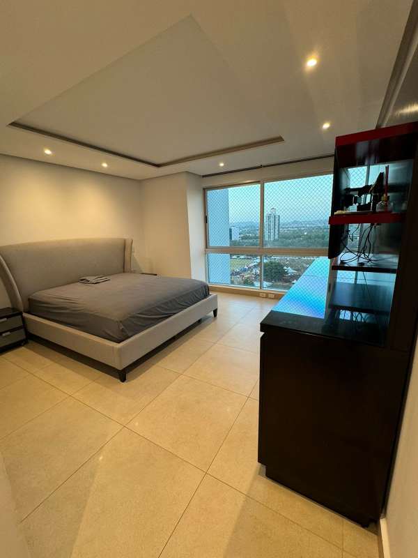 Bright living dining area with large windows, views to park in PH Titanium Costa del Este Panama