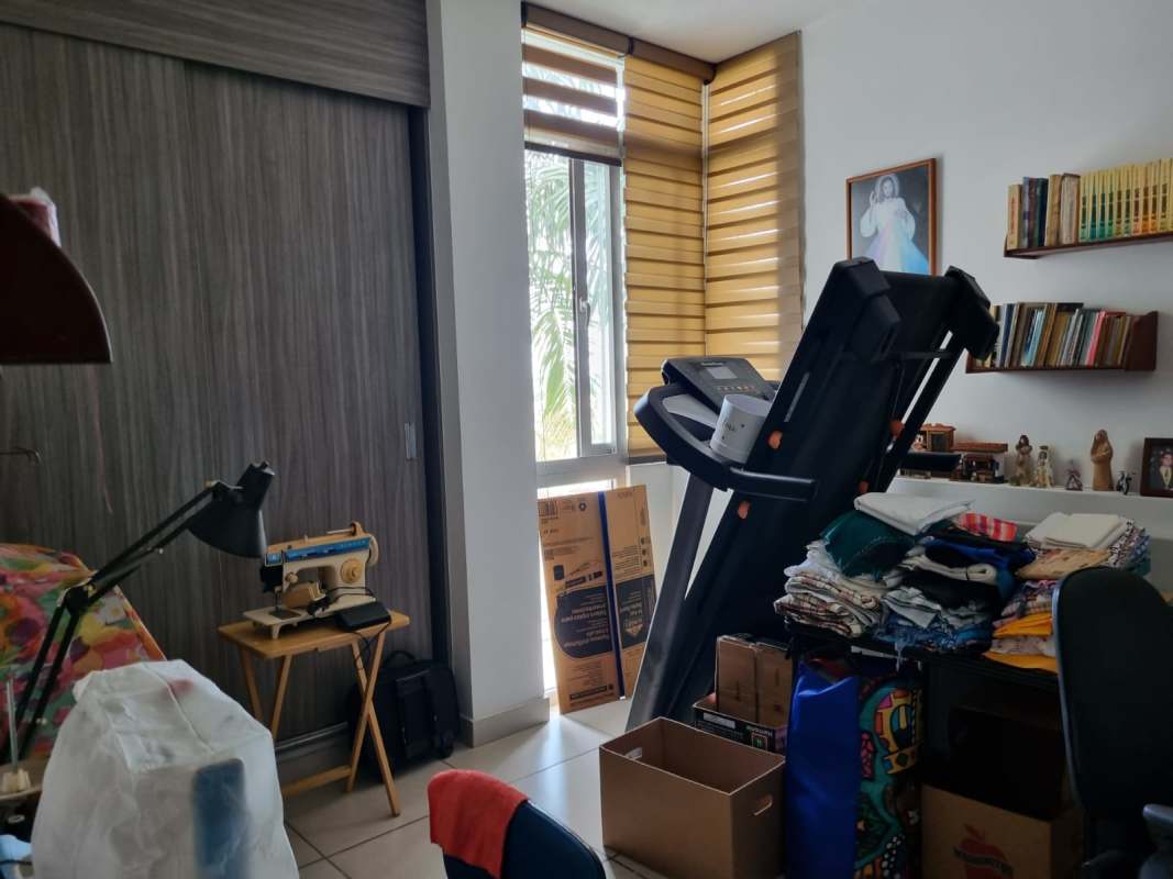 Den room with large window, built-in shelves in PH 4 Horizontes Altos de Panamá