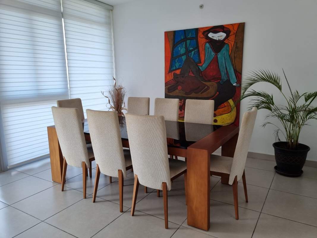 Dining room with large window and contemporary decor PH 4 Horizontes Altos de Panamá