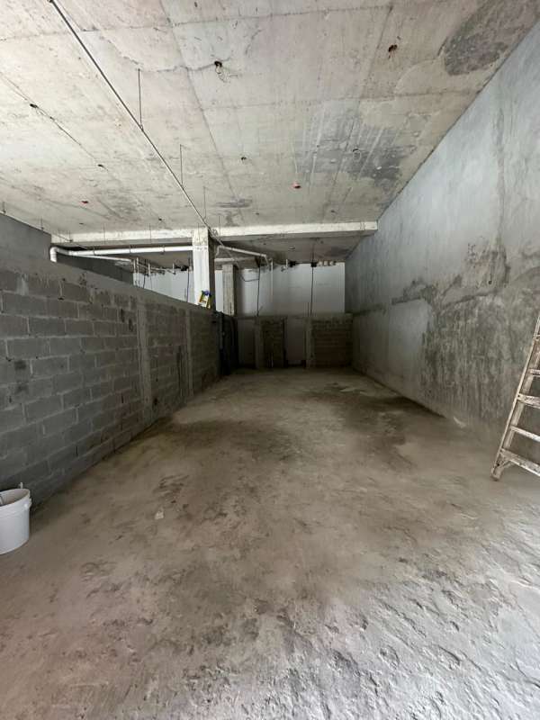 Industrial-style open unfinished basement or storage inside commercial plaza Panama City