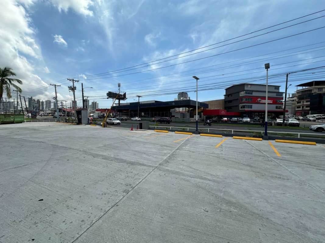 Empty parking lot and commercial facade area in Panama Plaza with signage