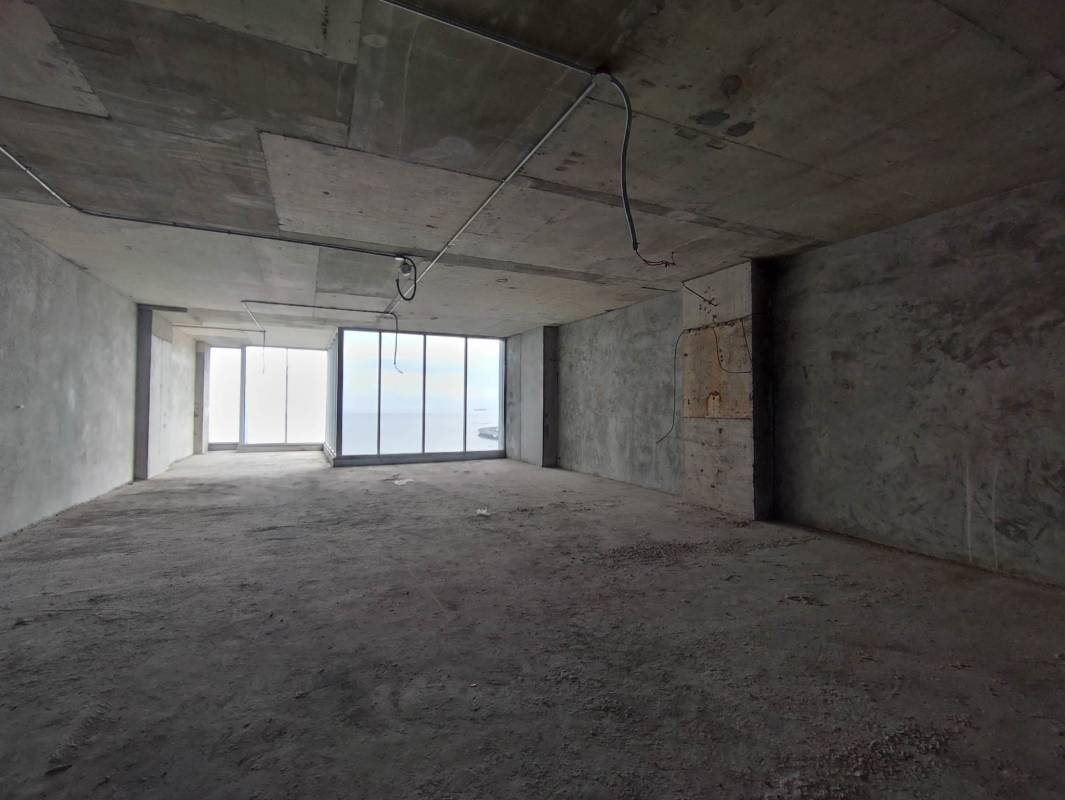 Modern commercial lobby lounge area with seating Helsinki Office Center Panama