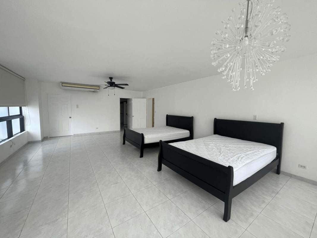 Modern kitchen with granite countertops appliances in PH Princesa oceanfront apartment Panama City