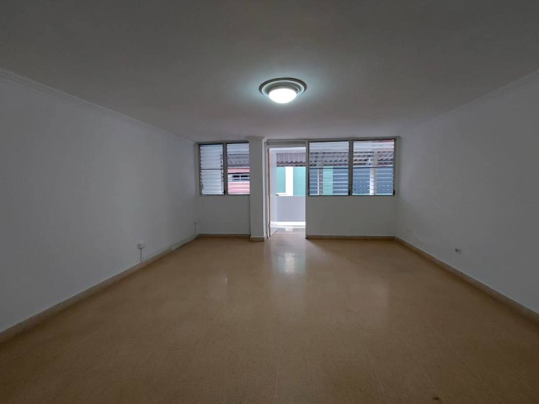 Open living dining area with large windows in PH El Cangrejo Classic Panama City