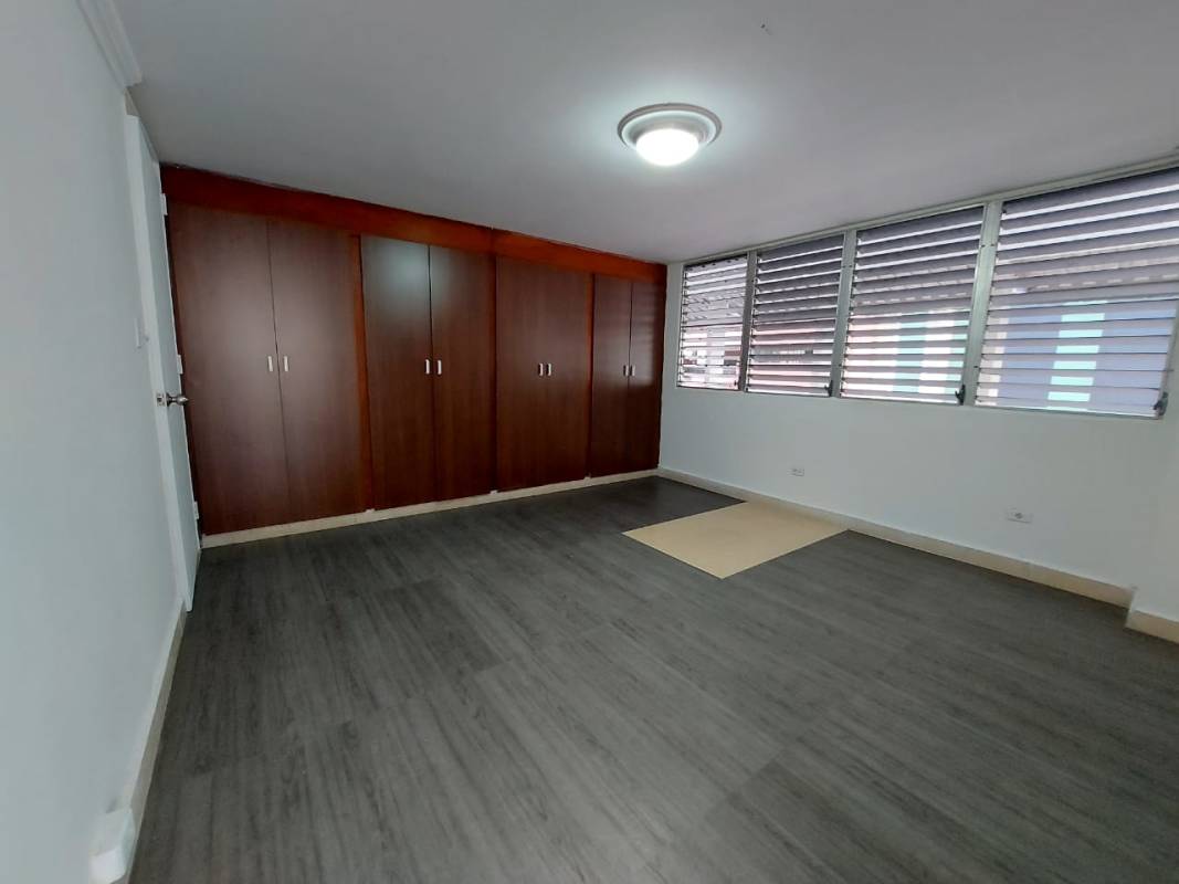 Empty bedroom with closet and louvered windows PH El Cangrejo Classic Panama