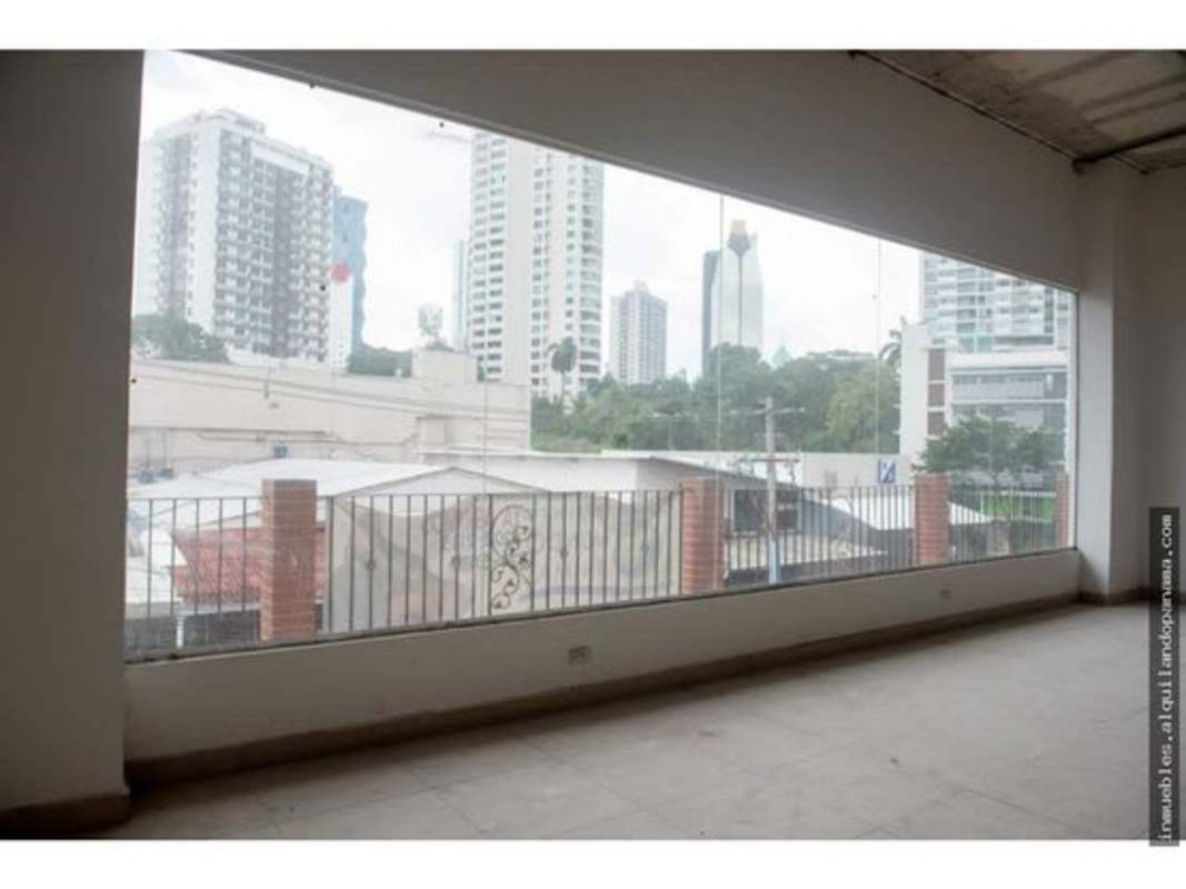 Large windows with city views inside commercial space Plaza Bella Vista Panama