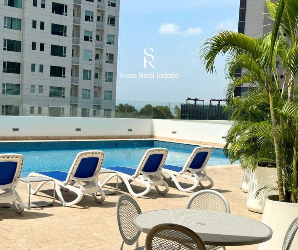 Infinity pool and lounging area in PH Costa del Este Tower Panama City