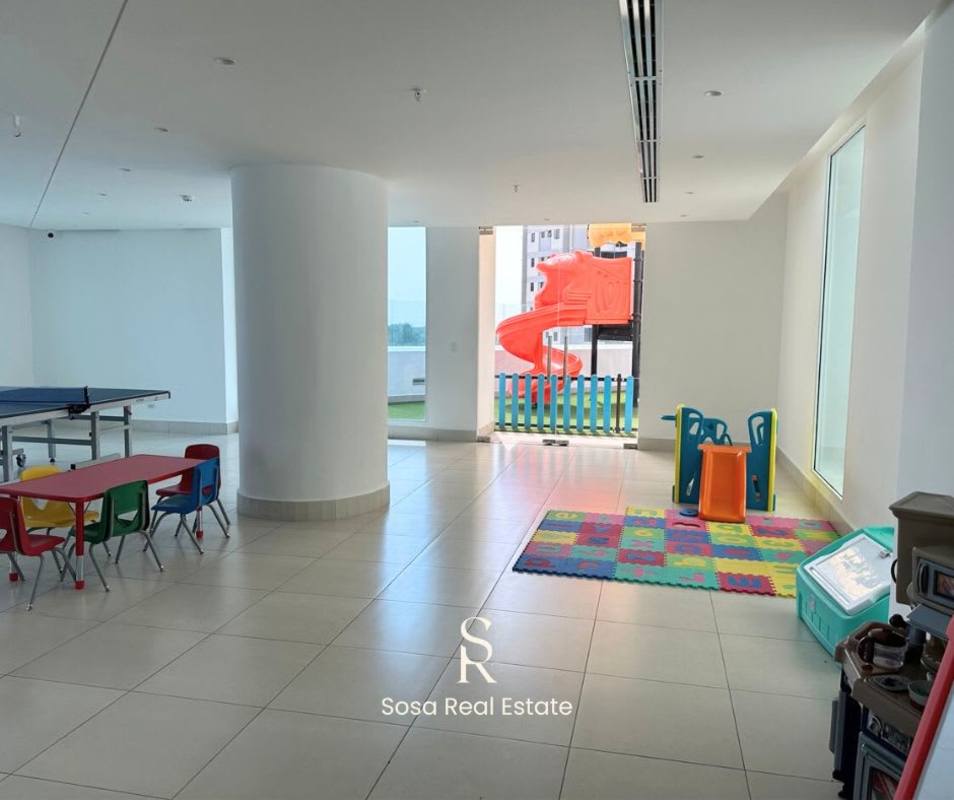 Modern kitchen with mosaic tiles, stainless appliances in PH Costa del Este Tower