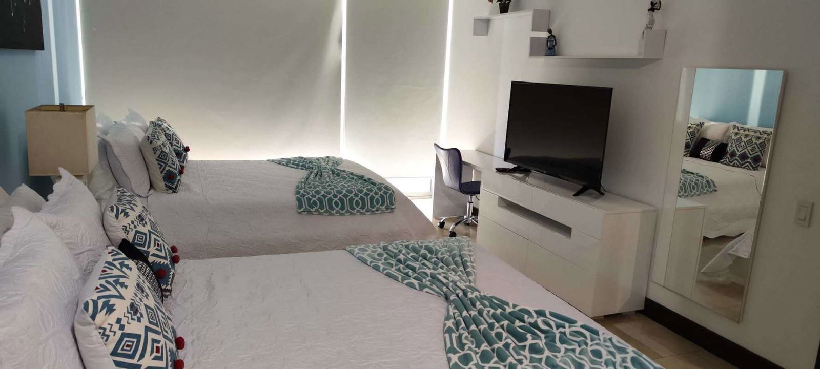 Modern bright living room with ocean panorama in The Ocean Club Panama