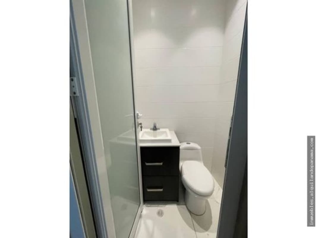 Bright hallway with marble floor, neutral walls inside commercial clinic office in Town Center