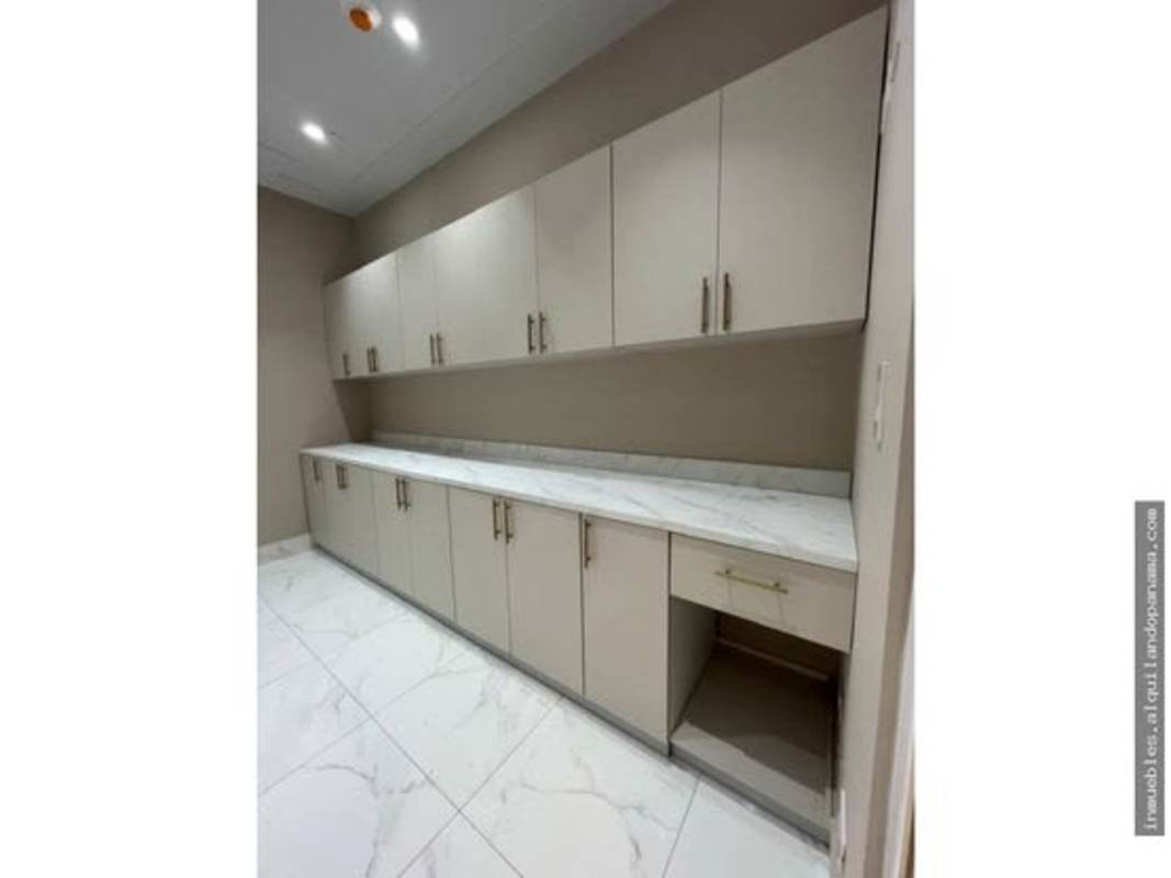 Compact modern bathroom with shower, white tiles and vanity in Town Center Costa del Este medical space