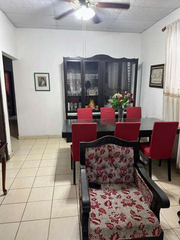 Covered tile patio and carport gated entry residential house Chanis Panama