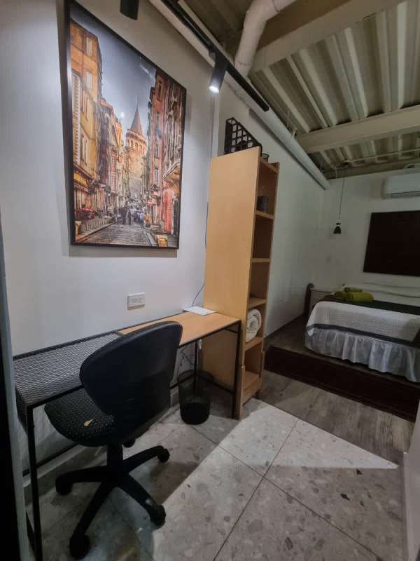 Compact laundry with washer glass partition in studio PH Clayton Park Clayton Panama