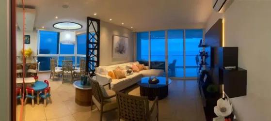 Contemporary hallway with accent niches, lighting, and neutral tiles in Santa Clara beachfront property