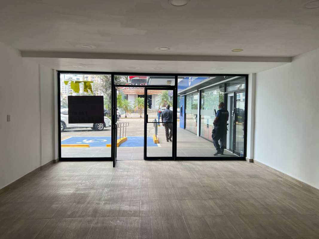 Spacious empty commercial unit with tile floor and lighting in Plaza Marbella Panama