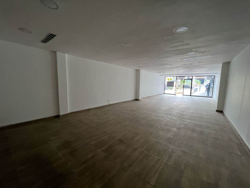 Spacious retail office interior empty with glass storefront in Marbella district Panama City