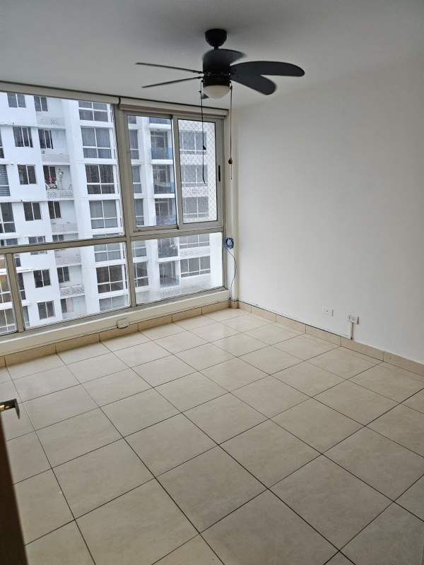 Bright master bedroom with large windows and city views at PH Ecco Tower Hato Pintado Panama