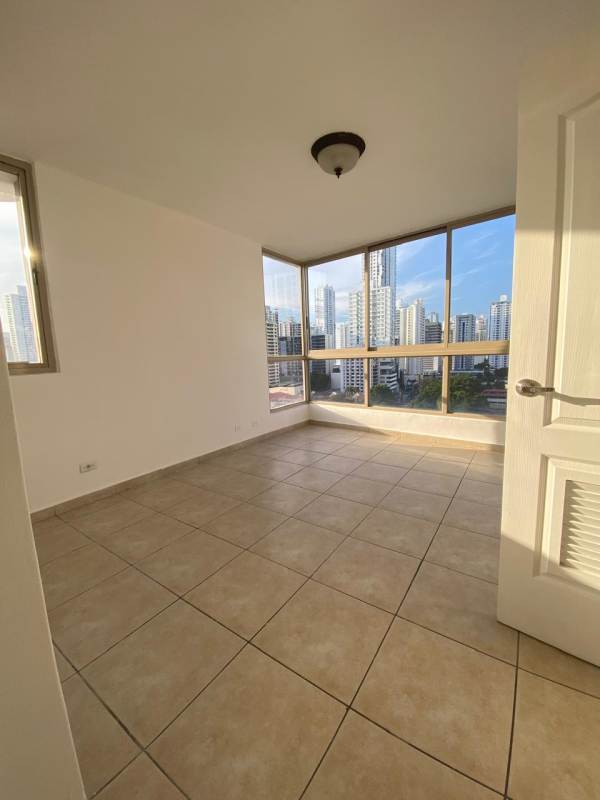 Empty bedroom with built-in closet and tiled floors in apartment for rent PH San Francisco Bay Panama