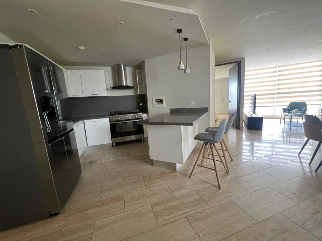 Spacious dining area with access to panoramic balcony at The Regent Costa del Este Panama