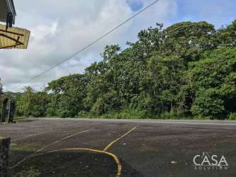 Fully equipped commercial kitchen with stainless counters and gas stove in Volcán Panama property