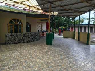 Rustic stone accents exterior guest room commercial property Volcán Panama