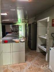 Colorful covered restaurant terrace with communal seating for sale Volcán Panama