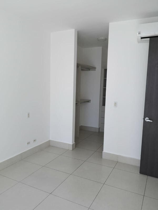 Kitchen with granite counter, gas stove and appliances in PH Castellamare Panama