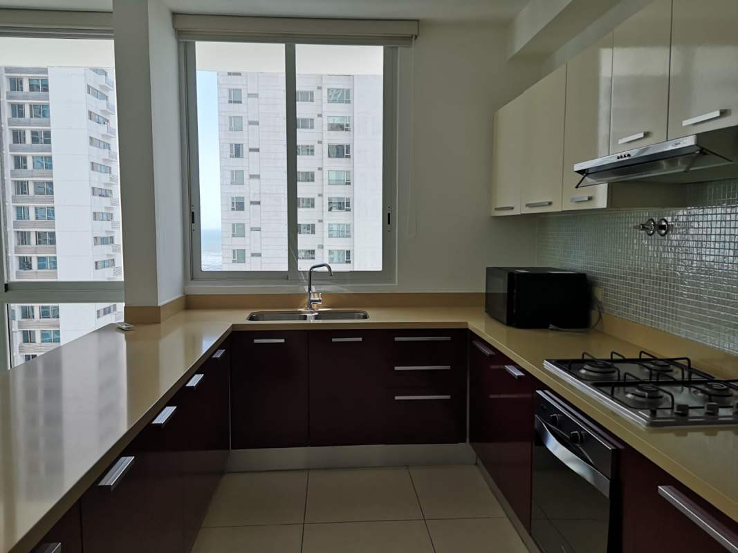 Bright bedroom with large window and ocean views Costa del Este Panama