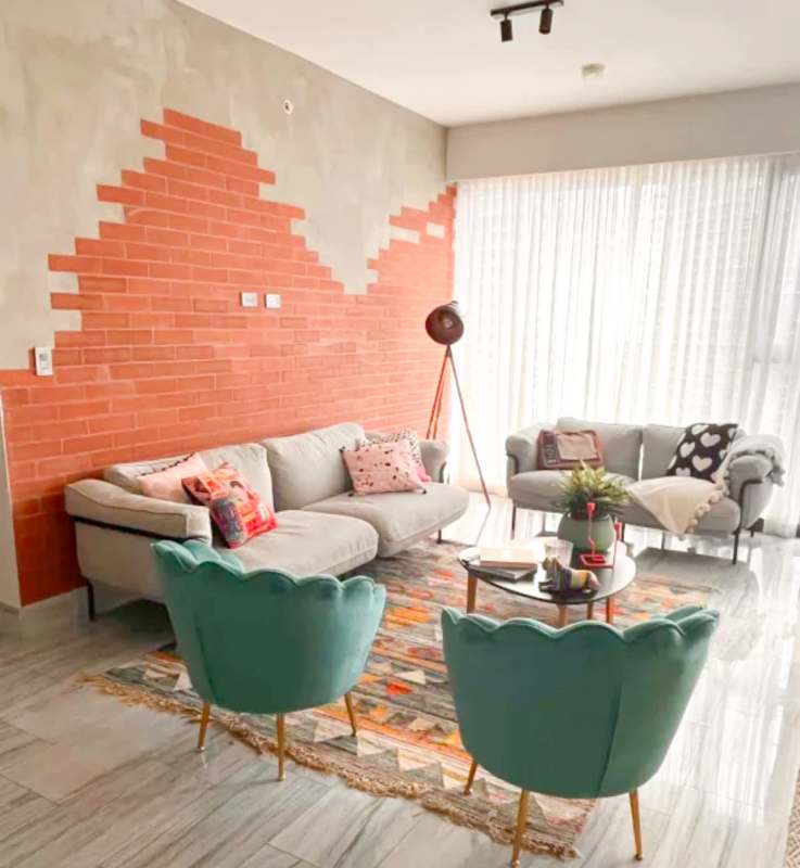 Luxurious infinity pool area with sun deck overlooking Panama Bay at Nuovo