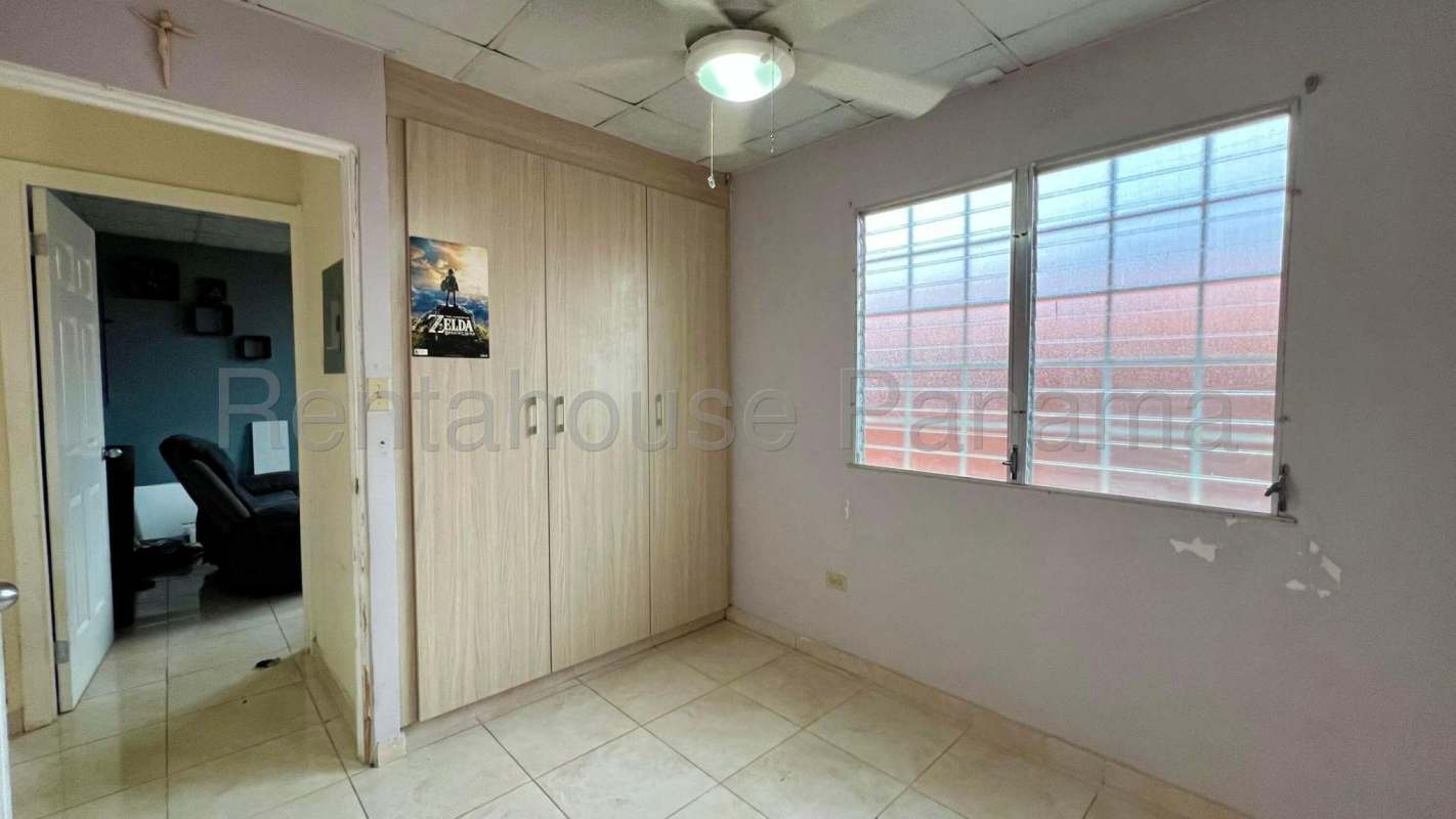 Kitchen with granite counters wood cabinetry tile floor Ciudad del Lago Panama