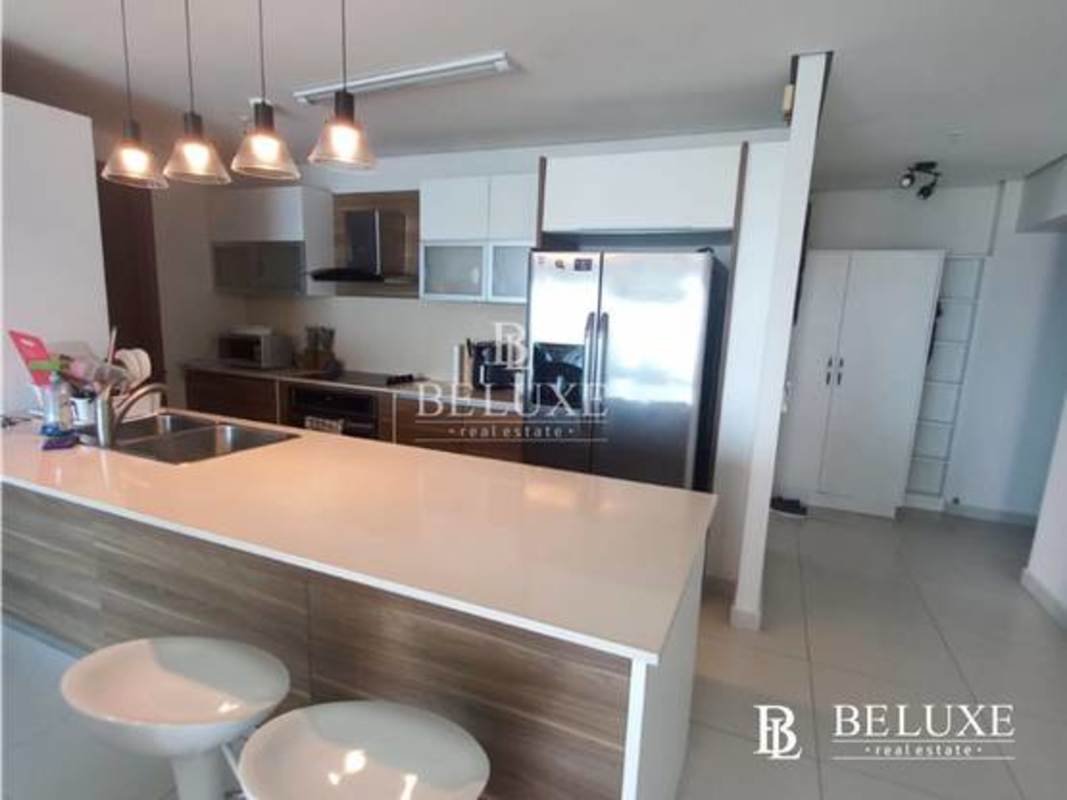 Spacious bedroom with large windows, ocean and skyline views in PH Parkside Panama