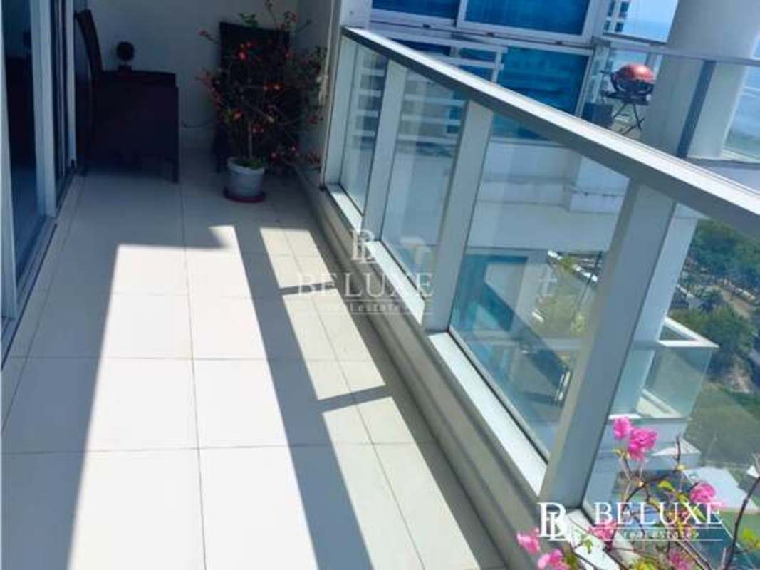 Contemporary kitchen with island, stainless appliances at PH Parkside Costa del Este