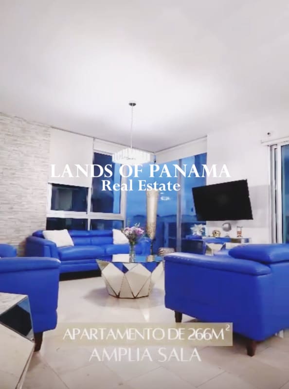 Spacious kitchen with wooden cabinetry, built-in appliances and breakfast space in PH Pacific Village Panama