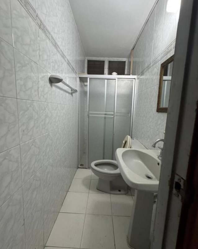 Large traditional kitchen with beige cabinetry, U-shape counters in Altos del Chase house Panama