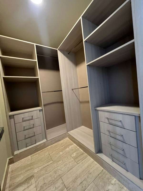 Modern open-plan dining and living area with marble floors and natural light PH The Regent Costa del Este Panama