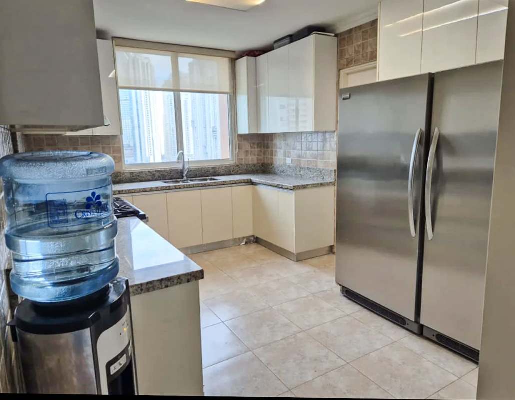 Bedroom with floor to ceiling windows and city skyline view PH Mystic Point Panama