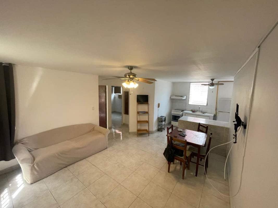 Bedroom with air conditioner, ceiling fan, tile floors in PH Villas El Carmen La Cresta Panama City