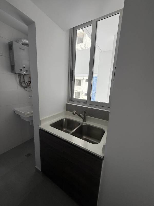 Living dining area with large windows balcony in PH Park Square Carrasquilla Panama City