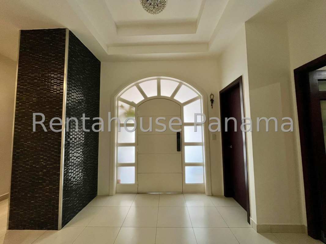Elegant foyer entrance with chandelier and modern finishes luxury house Sunset Coast Costa Sur Panama