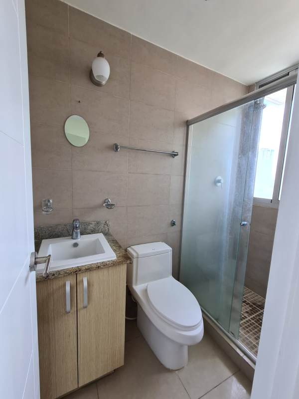 Modern bathroom glass shower enclosure granite countertop PH Condado Gardens Condado del Rey Panama