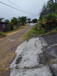 Shaded patio terrace overlooking garden at Boquete mixed-use commercial and residential estate Panama