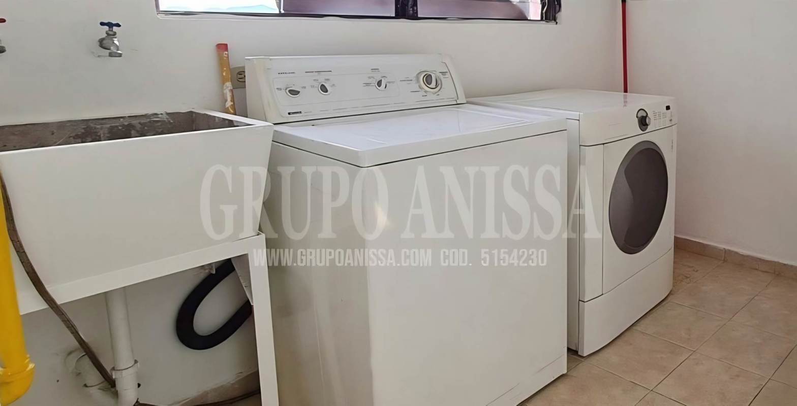 Living and dining room white furniture glass table PH Villa de las Fuentes Panama