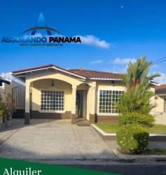 Exterior of Mediterranean-style one level house for rent with driveway and garden Montelimar Costa Verde Panama