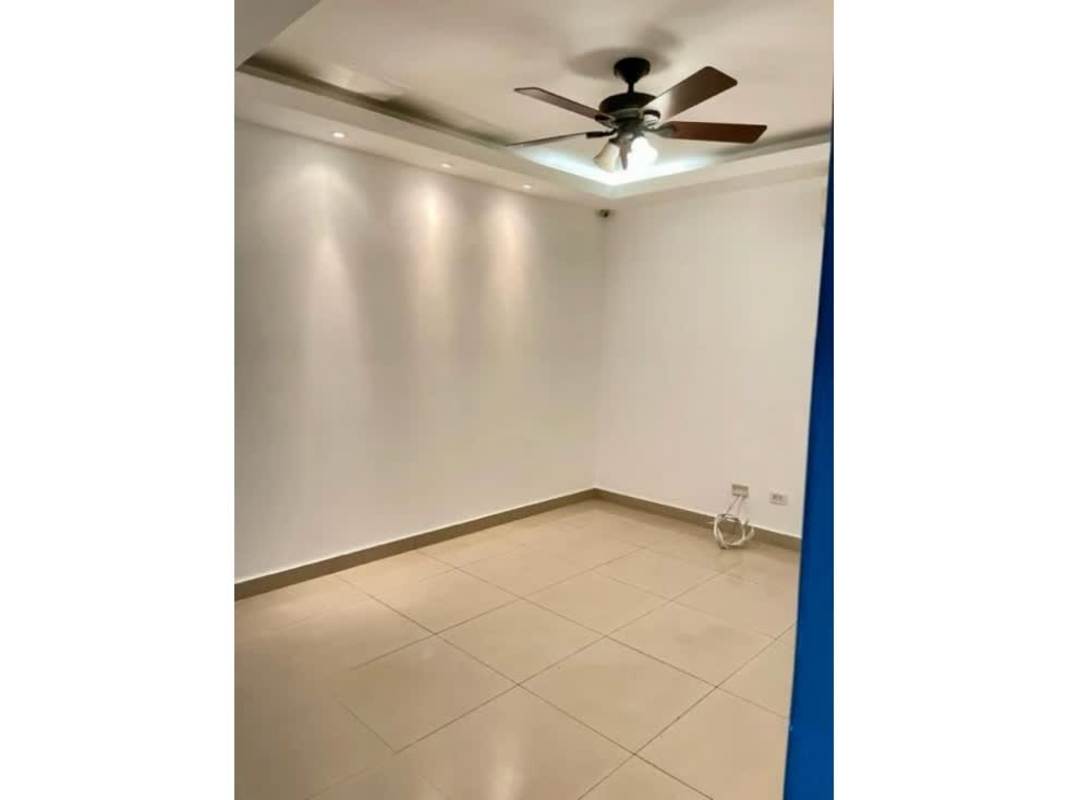 Modern bedroom with tile floors, ceiling fan, AC in PH Coco del Mar Panama City